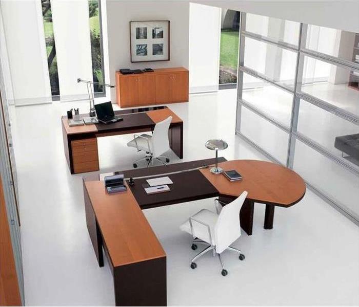 An office setting with desks 